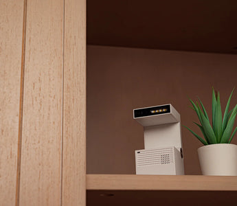 Motion-detecting camera placed on a shelf, blending discreetly with home decor